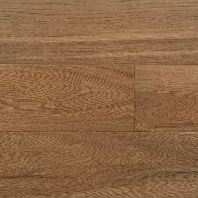 Plancher d'ingénierie en chêne blanc Portobello, lames larges de 7,5 pouces, finition brossée mate, couleur brun moyen chaud, texture du bois visible, aspect élégant et contemporain. Nouveautés, En stock, Tous produits, Plancher d'ingénierie
