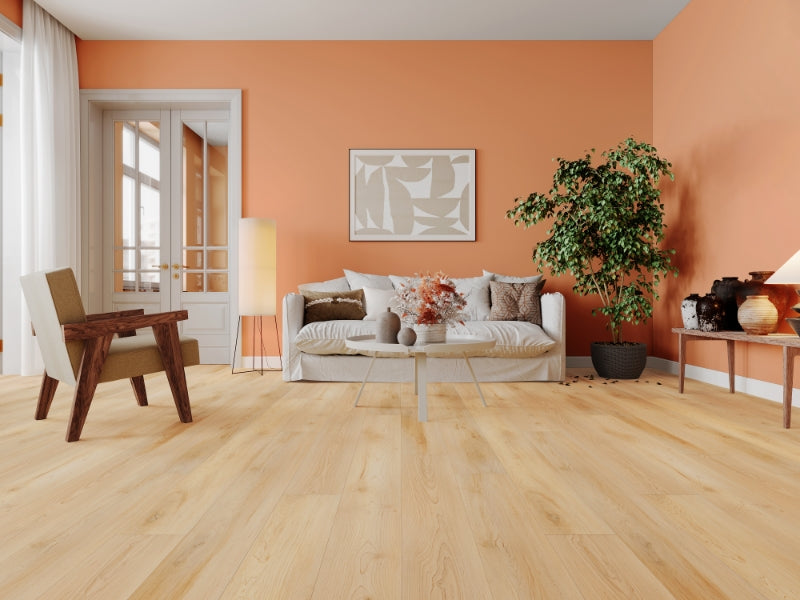 Magnifique vinyle spc qui apporte a ce salon un touche chaleureuse et réconfortante. Le tout combiné à des meubles de teinte crème pour apporter de la lumière. 