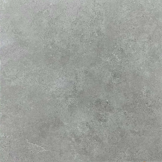 Carrelage Céramique Crown Grigio 24x24 pouces, surface semi-polie gris clair avec texture délicate, aspect pierre naturelle pour sols et murs, idéal pour intérieurs modernes et élégants