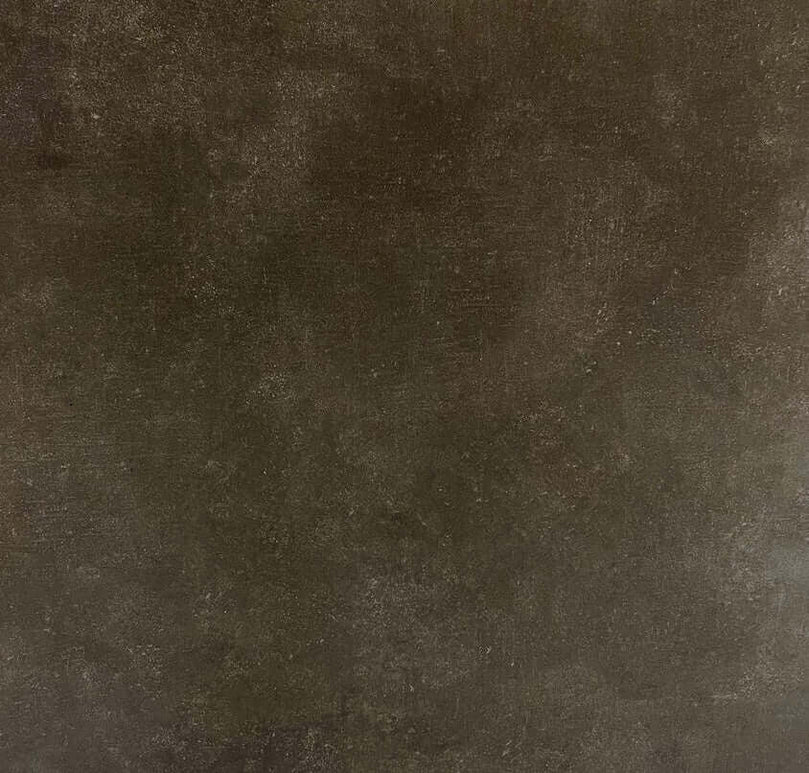 Carreau en céramique gris foncé au fini mat, offrant une texture subtile et une belle profondeur, idéal pour des applications murales ou au sol dans des espaces résidentiels ou commerciaux légers au style moderne.